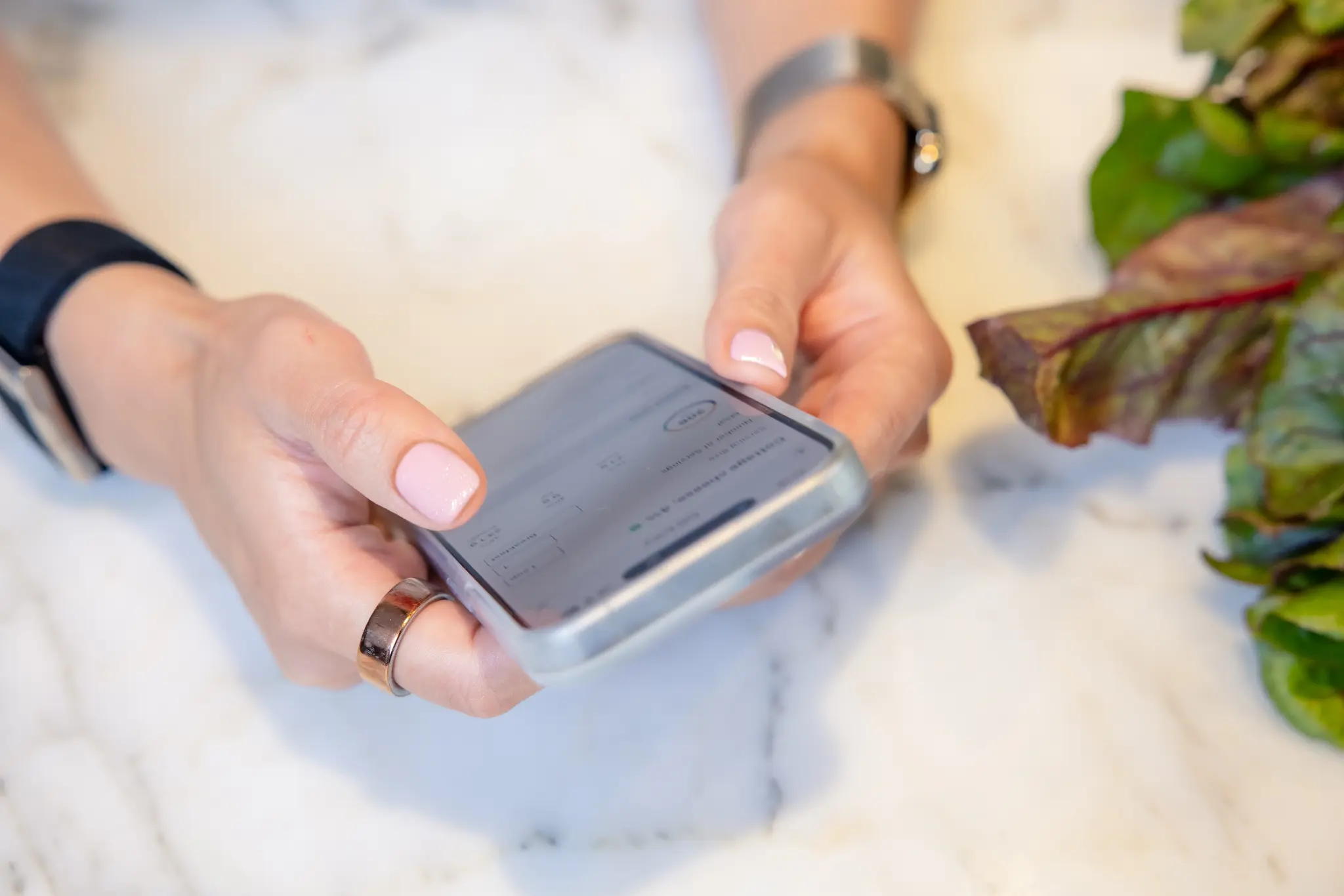 Smartphone displaying health data representing longevity coaching