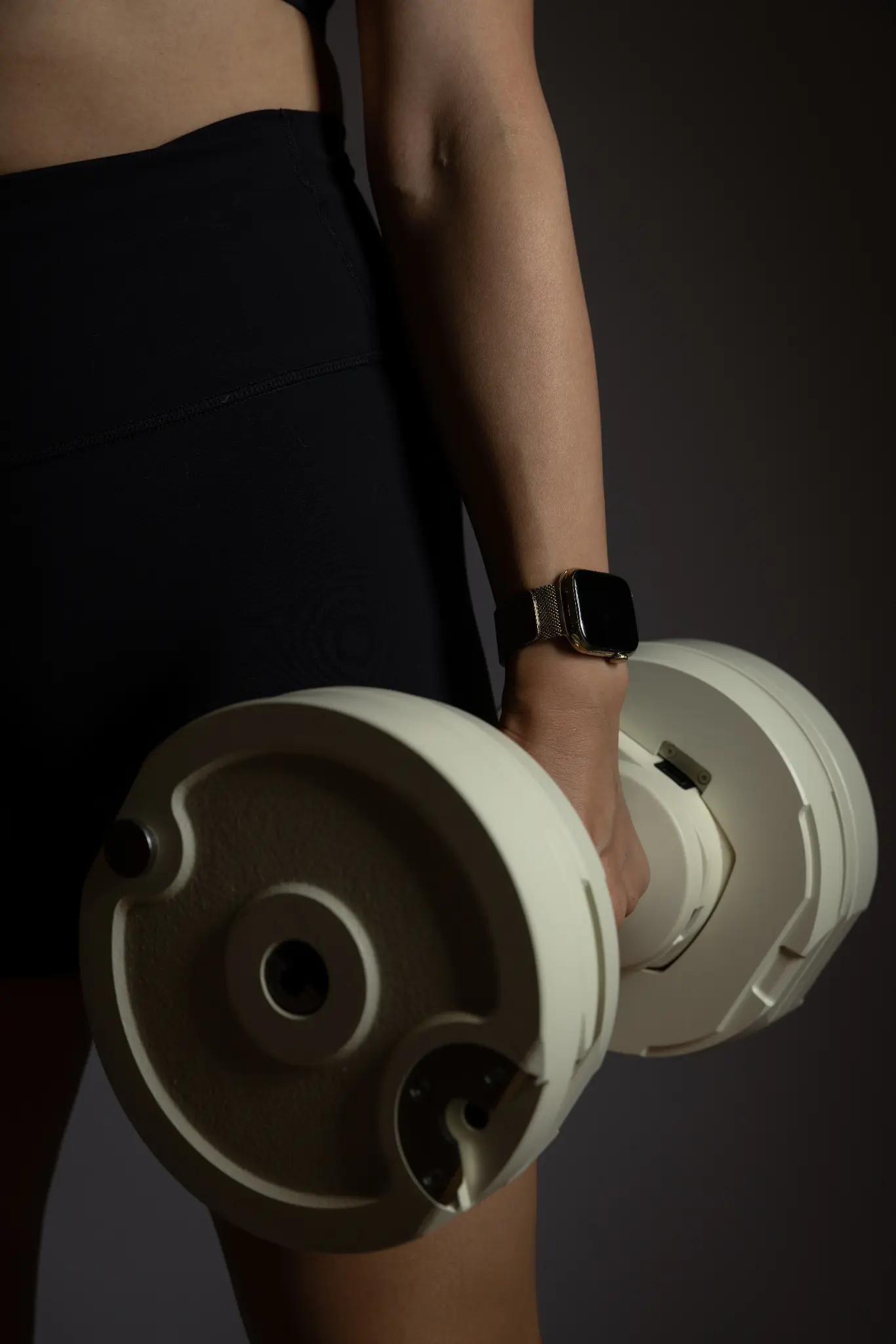 Dumbbell on a gym floor representing strength training protocols